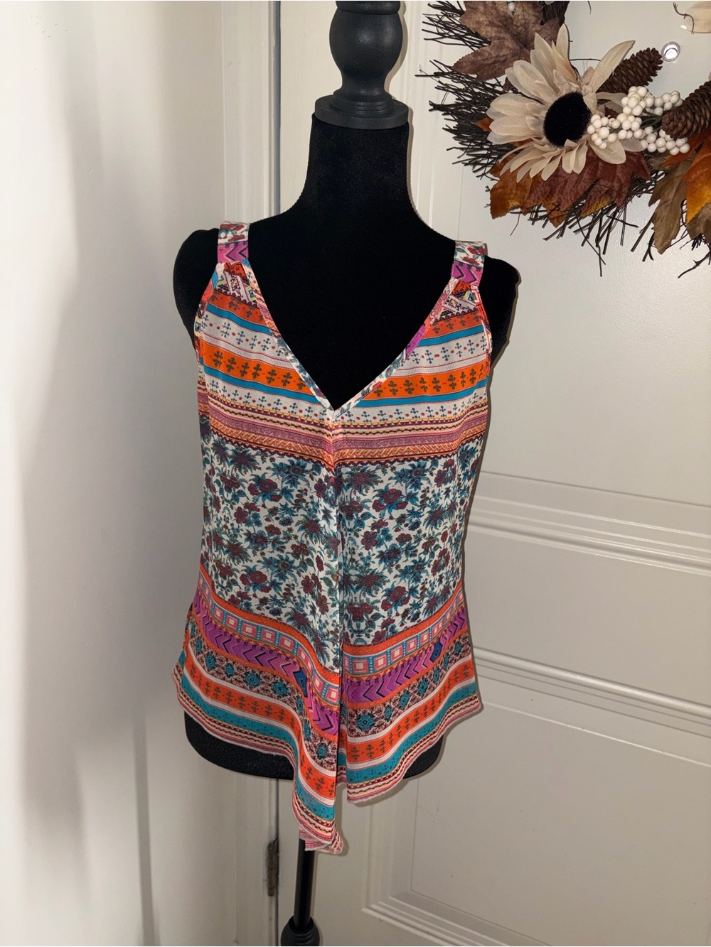 Beautiful multi color American Rag Tank. Sheer V neck front and back!